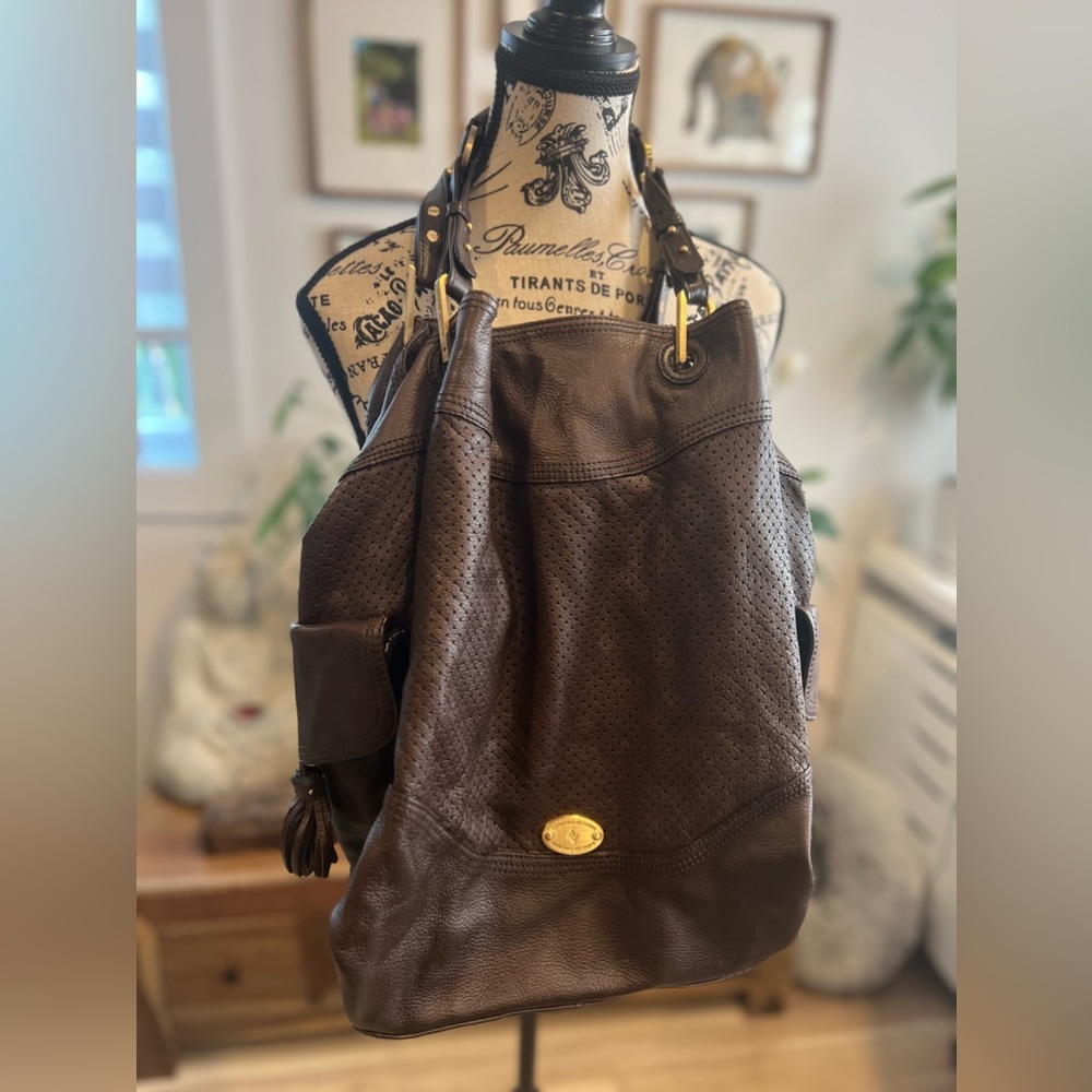 Adrienne Vittadini genuine leather shoulder bag. Brown perforated leather